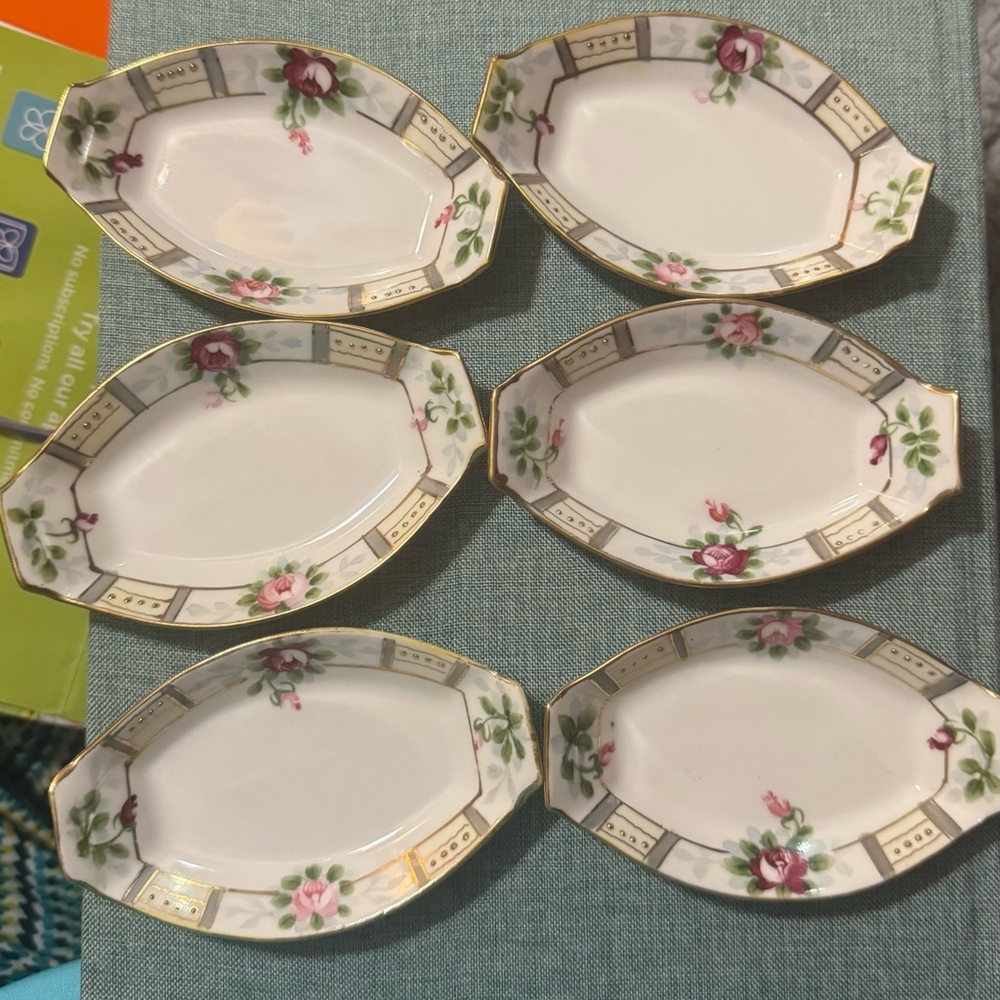 White and Green Porcelain Serveware likely salt 
Servers